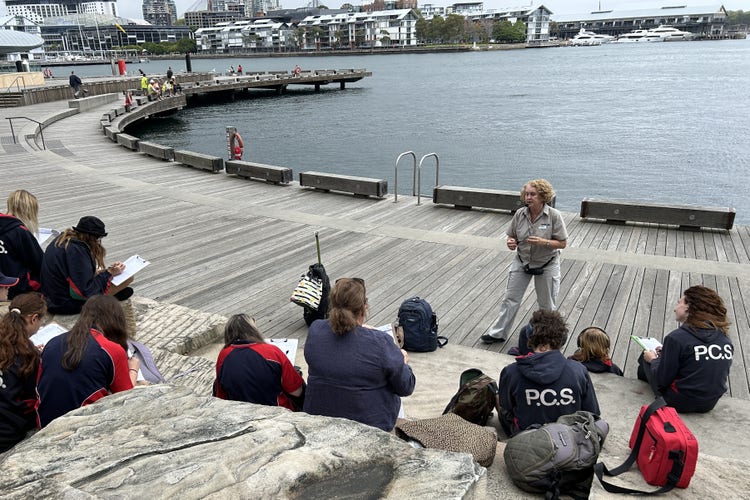 Students listening to guide at Barrangaroo