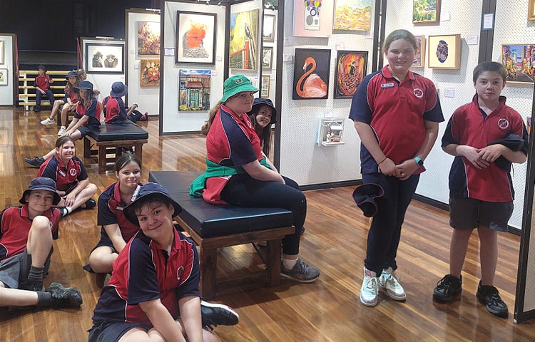 Students visiting a local art show